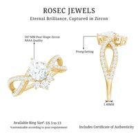 Pear cut cubic zirconia crossover engagement ring in silver tone from Rosec Jewels, showcasing polished band and sparkling stones.