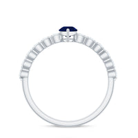 Minimal blue sapphire solitaire promise ring with diamond, featuring a sleek band and elegant gemstone setting by Rosec Jewels.