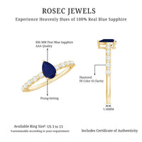 Minimal blue sapphire solitaire promise ring with a diamond, showcasing a sleek band and a vibrant blue sapphire centerpiece.