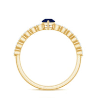 Minimal blue sapphire solitaire promise ring with diamond by Rosec Jewels, featuring a sleek design and a central blue sapphire gemstone.