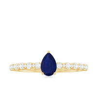 Minimal blue sapphire solitaire promise ring with diamond accent, crafted by Rosec Jewels, featuring a sleek band and elegant design.