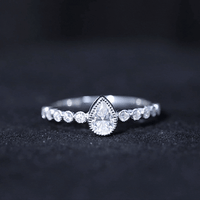 Beaded Bezel Set Moissanite Pear Engagement Ring