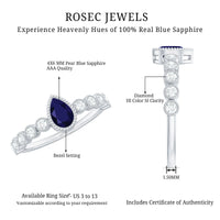 Pear cut 0.5 carat blue sapphire engagement ring with diamonds, showcasing a Rosec Jewels rings design with intricate details.