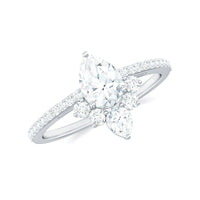 Pear-shaped 0.7 carat moissanite engagement ring with a crown setting from Rosec Jewels, showcasing sparkling gemstone and elegant design.