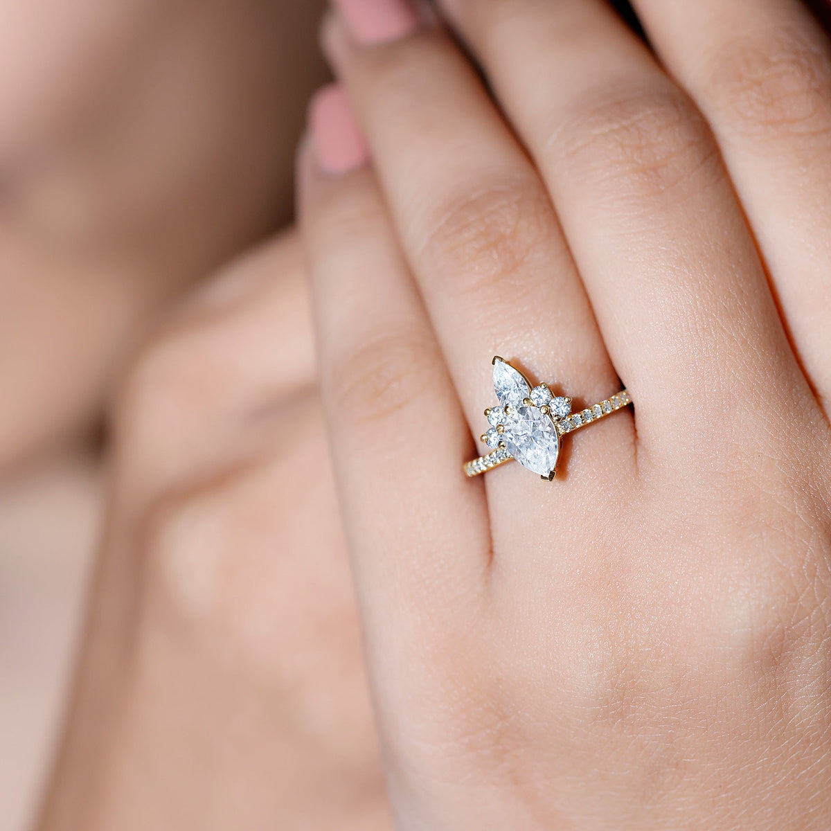 Pear-shaped 0.7 carat moissanite crown engagement ring by Rosec Jewels featuring a sparkling central stone and intricate band details.