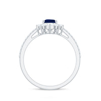 Pear-shaped blue sapphire engagement ring with diamond accents from Rosec Jewels, featuring a 0.5 carat sapphire and elegant crown setting.