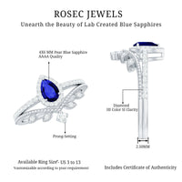 Pear-shaped blue sapphire engagement ring set with diamonds, lab-grown blue sapphire, and elegant ring design by Rosec Jewels.