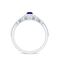 Blue sapphire pear-shaped engagement ring set with diamonds from Rosec Jewels, showcasing the elegant ring design and sparkling stones.