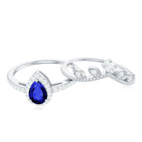 Blue sapphire pear-shaped engagement ring set with diamonds from Rosec Jewels, featuring a stunning lab-grown gemstone and intricate design.