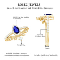 Blue sapphire pear-shaped engagement ring set with diamonds, crafted by Rosec Jewels, showcasing the detailed gemstone and elegant band design.