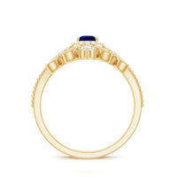 Blue sapphire pear-shaped engagement ring set with diamonds by Rosec Jewels, featuring a stunning blue sapphire center and sparkling side stones.