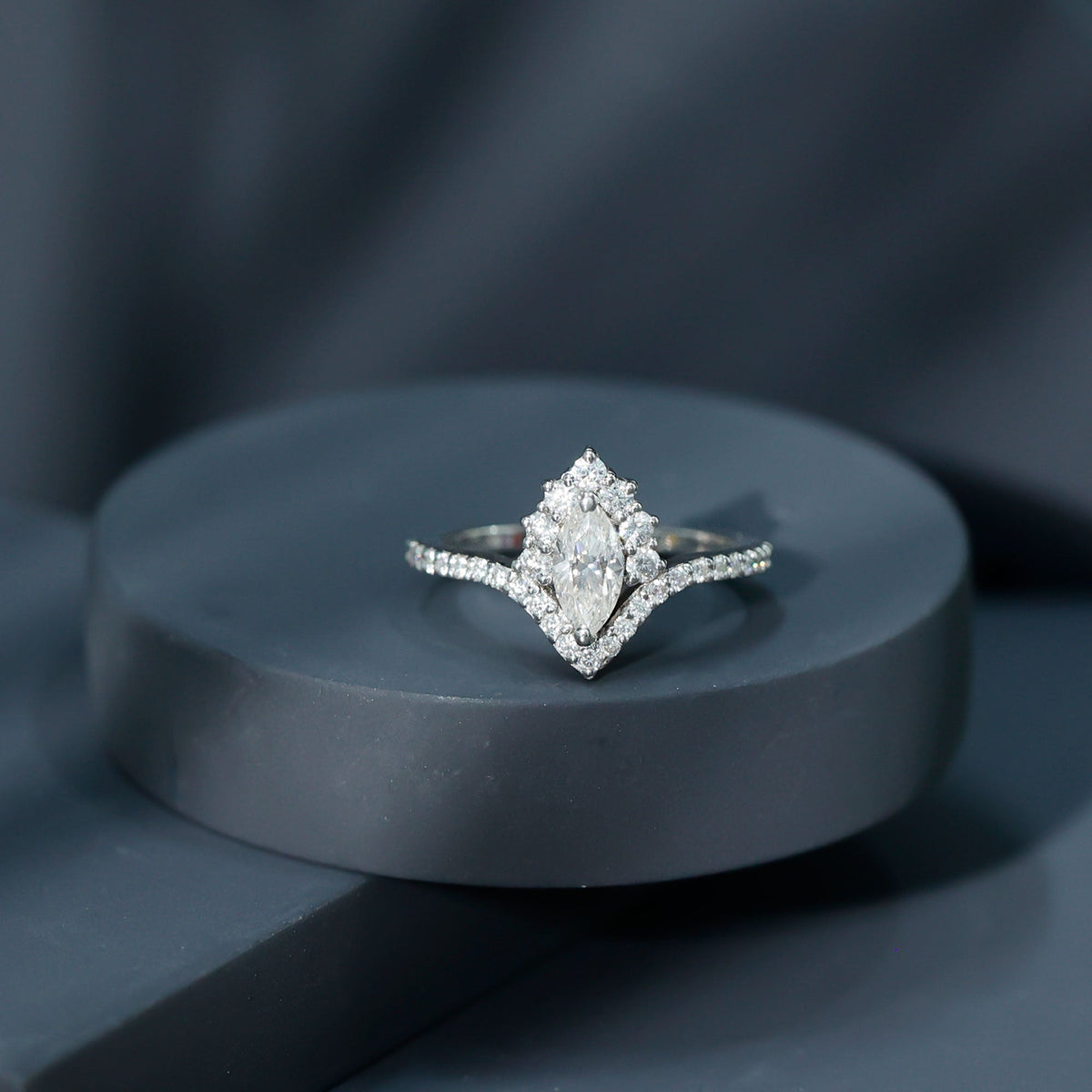 Marquise cut moissanite engagement ring by Rosec Jewels featuring a sparkling center stone and elegant band design.