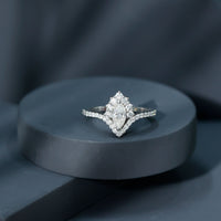 Marquise cut moissanite engagement ring by Rosec Jewels featuring a sparkling center stone and elegant band design.