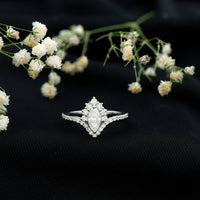 Marquise cut moissanite designer engagement ring by Rosec Jewels featuring a sparkling central stone and elegant band design.