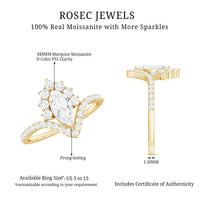 Marquise cut Moissanite engagement ring by Rosec Jewels featuring a sparkling center stone and intricate band design.