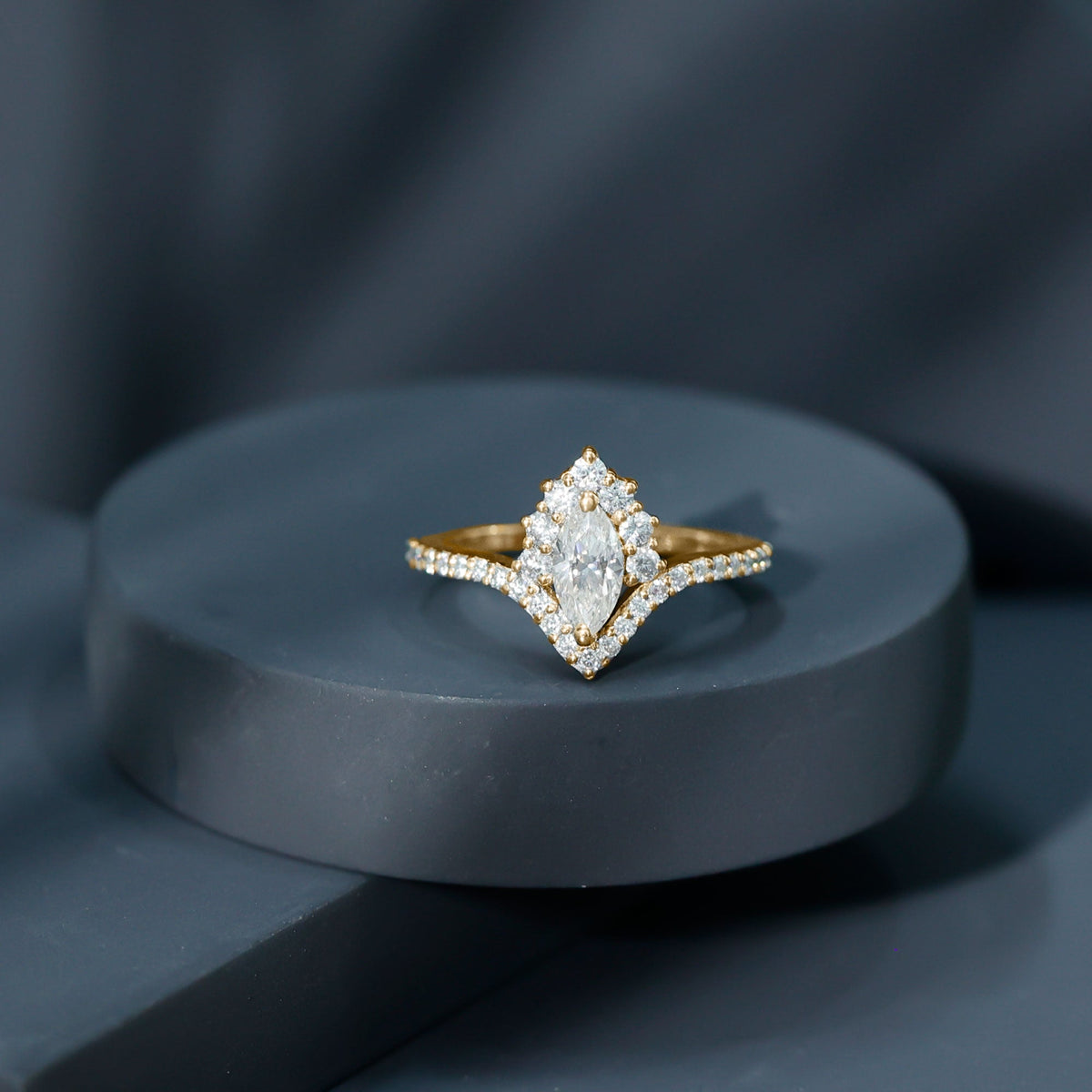 Marquise cut Moissanite engagement ring by Rosec Jewels featuring a sparkling central stone and elegant band design.