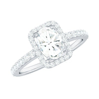 Oval cut zircon halo engagement ring with side stones from Rosec Jewels, featuring a sparkling central stone and detailed band.