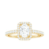 Oval cut zircon halo engagement ring with side stones from Rosec Jewels, featuring a sparkling central stone and intricate band details.