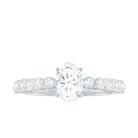 Rosec Jewels 1.75 CT prong set oval cubic zirconia solitaire engagement ring with silver band, close-up view of the sparkling center stone.