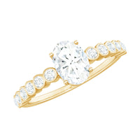 Oval cut moissanite engagement ring with side stones, featuring a sparkling band from Rosec Jewels.