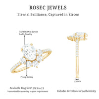 Oval cubic zirconia engagement ring with half halo design by Rosec Jewels, featuring a sparkling central stone and intricate band.