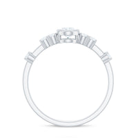 Oval shape Zircon solitaire engagement ring with side stones from Rosec Jewels, showcasing a sparkling central zircon and elegant side accents.