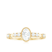 Oval shape zircon solitaire engagement ring with side stones by Rosec Jewels, featuring a sparkling central zircon and elegant band.