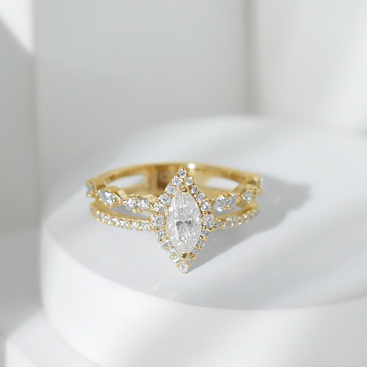 Marquise cut moissanite double band engagement ring by Rosec Jewels with certificate showing intricate silver design and sparkling gemstones.