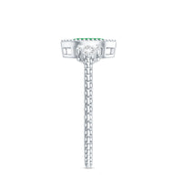 Vintage-inspired emerald engagement ring with trio diamonds from Rosec Jewels, showcasing a detailed band and sparkling gemstones.