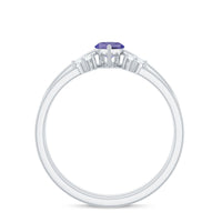 Pair of natural marquise tanzanite diamond promise rings by Rosec Jewels, showcasing elegant gemstone settings and intricate band design.