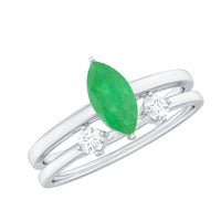 Two natural marquise emerald diamond promise rings from Rosec Jewels, featuring elegant gold bands and sparkling gemstones.