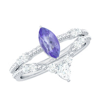 Natural marquise Tanzanite diamond engagement ring set featuring a sparkling Tanzanite center stone and diamond accents by Rosec Jewels
