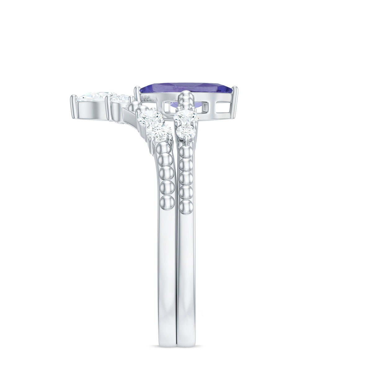 Natural Marquise Tanzanite and diamond engagement ring set by Rosec Jewels, featuring a marquise-shaped tanzanite surrounded by diamonds.