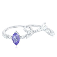 Natural Marquise Tanzanite diamond engagement ring set by Rosec Jewels featuring a marquise-cut tanzanite and diamond accents.