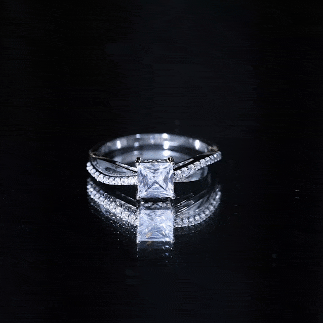 Rosec Jewels 1 Carat Princess Cut Cubic Zirconia Solitaire Engagement Ring with a sleek band and sparkling center stone.
