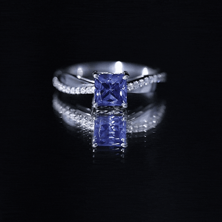 Lab grown 1.5 carat blue sapphire princess cut engagement ring with diamonds, crafted by Rosec Jewels.