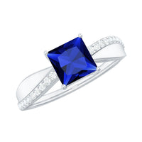 Certified 1.5 carat lab-grown blue sapphire princess cut engagement ring with diamonds by Rosec Jewels, showcasing the elegant ring design.