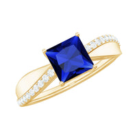 Lab-grown 1.5 carat blue sapphire princess cut engagement ring with diamonds, featuring a Rosec Jewels design.