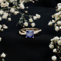 Lab grown blue sapphire princess cut engagement ring with diamonds by Rosec Jewels, featuring a 1.5 carat center stone.