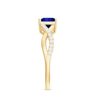 Lab-grown 1.5 carat blue sapphire princess cut engagement ring with diamond crossover shank by Rosec Jewels.