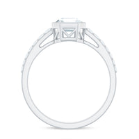 Asscher cut moissanite solitaire engagement ring in bezel setting featuring a sparkling center stone and sleek band.