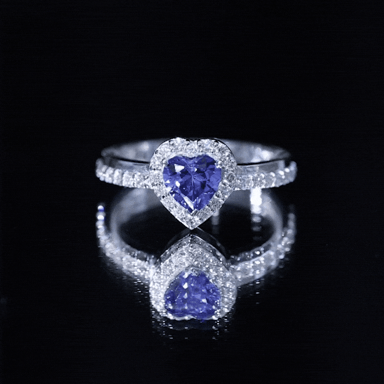 Yellow gold ring featuring a 0.9 carat lab-grown blue sapphire heart with diamond halo, Rosec Jewels engagement ring.