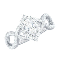 Marquise moissanite criss cross engagement ring with halo setting by Rosec Jewels, featuring sparkling stones and intricate band design.