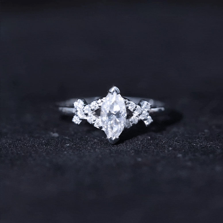 Yellow gold moissanite marquise engagement ring for women featuring a sparkling marquise-shaped stone and elegant band design.