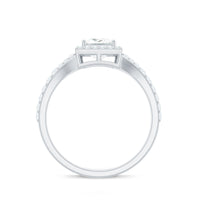 Princess cut moissanite halo engagement ring with split band, featuring intricate detailing and sparkling center stone design.