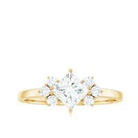 Rosec Jewels princess cut moissanite engagement ring with trio of stones, featuring a sparkling center stone and intricate band design.