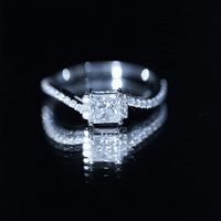 Princess cut moissanite bypass engagement ring for women by Rosec Jewels, showcasing sparkling white stones and elegant design.