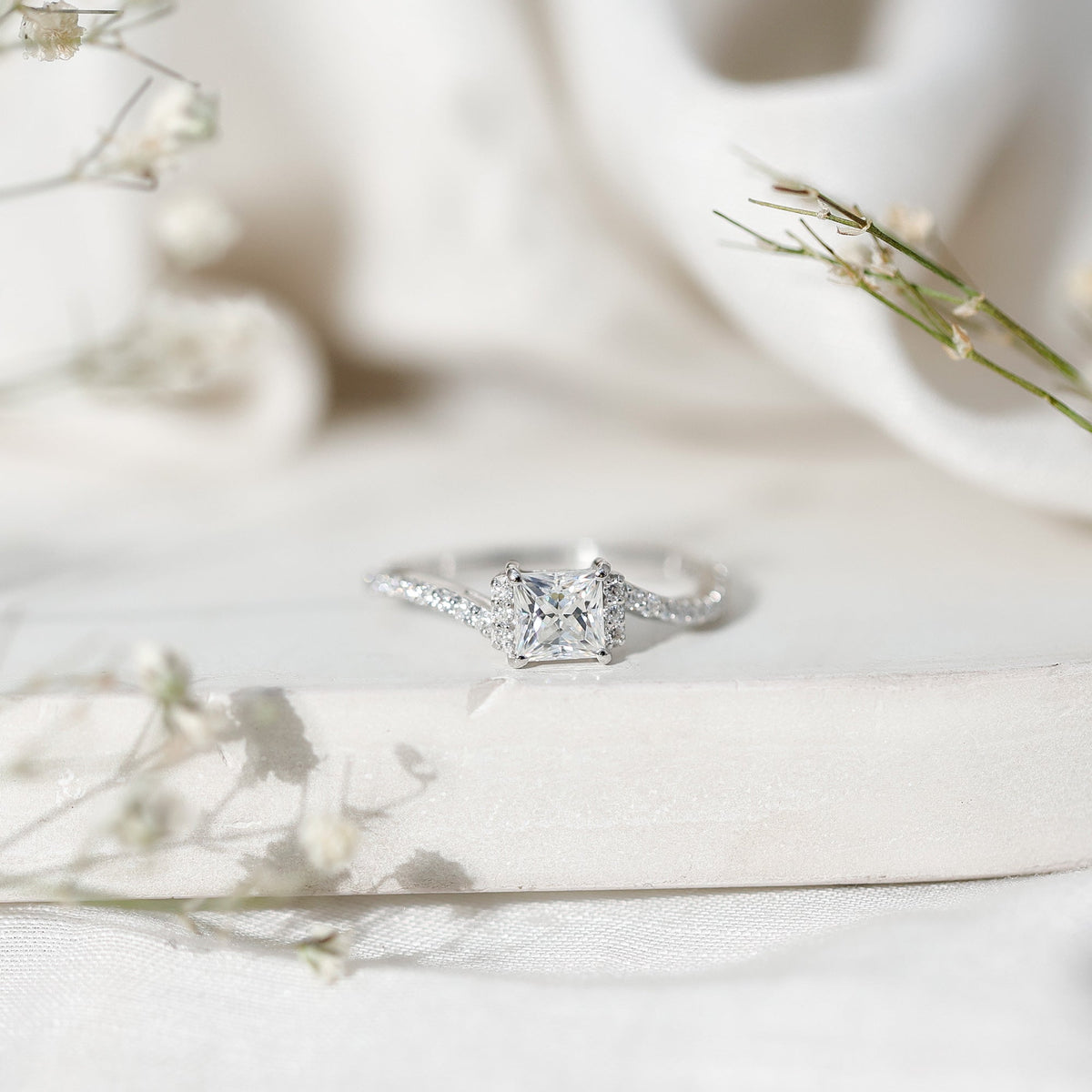 Princess cut moissanite bypass engagement ring for women with a sleek, modern design from Rosec Jewels.