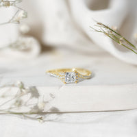 Princess cut moissanite bypass engagement ring for women from Rosec Jewels, featuring sparkling stones and a sleek band design.
