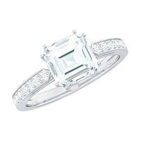 Asscher cut cubic zirconia solitaire engagement ring with a 2-carat center stone, set in a silver band, by Rosec Jewels.